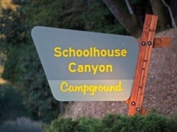 Schoolhouse Campground road sign, North side of River Road