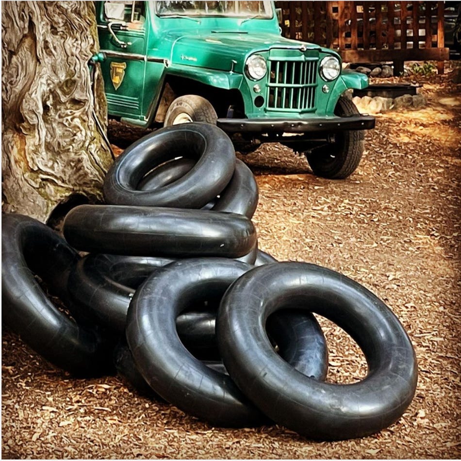 Inner tubes ready for rent with Willys truck at Schoolhouse Canyon